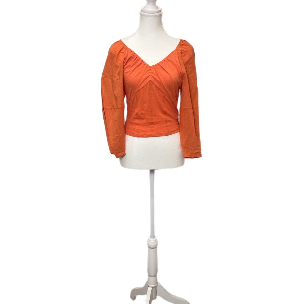 Anthropologie orange long sleeve blouse
